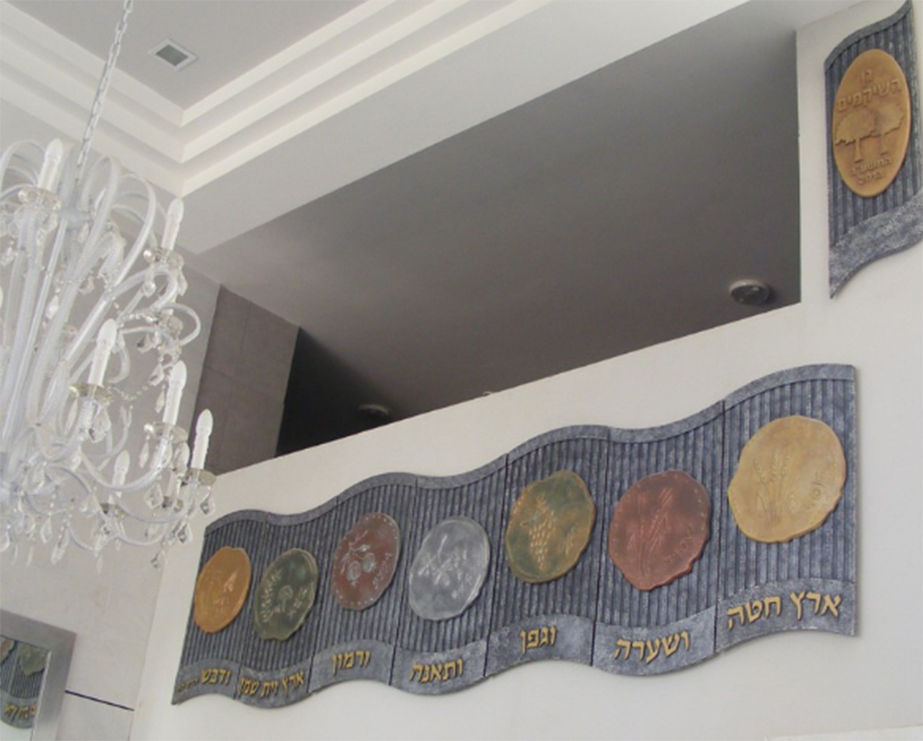 יצחק מרק   חיתוכי לייזר בשילוב פיסול.png