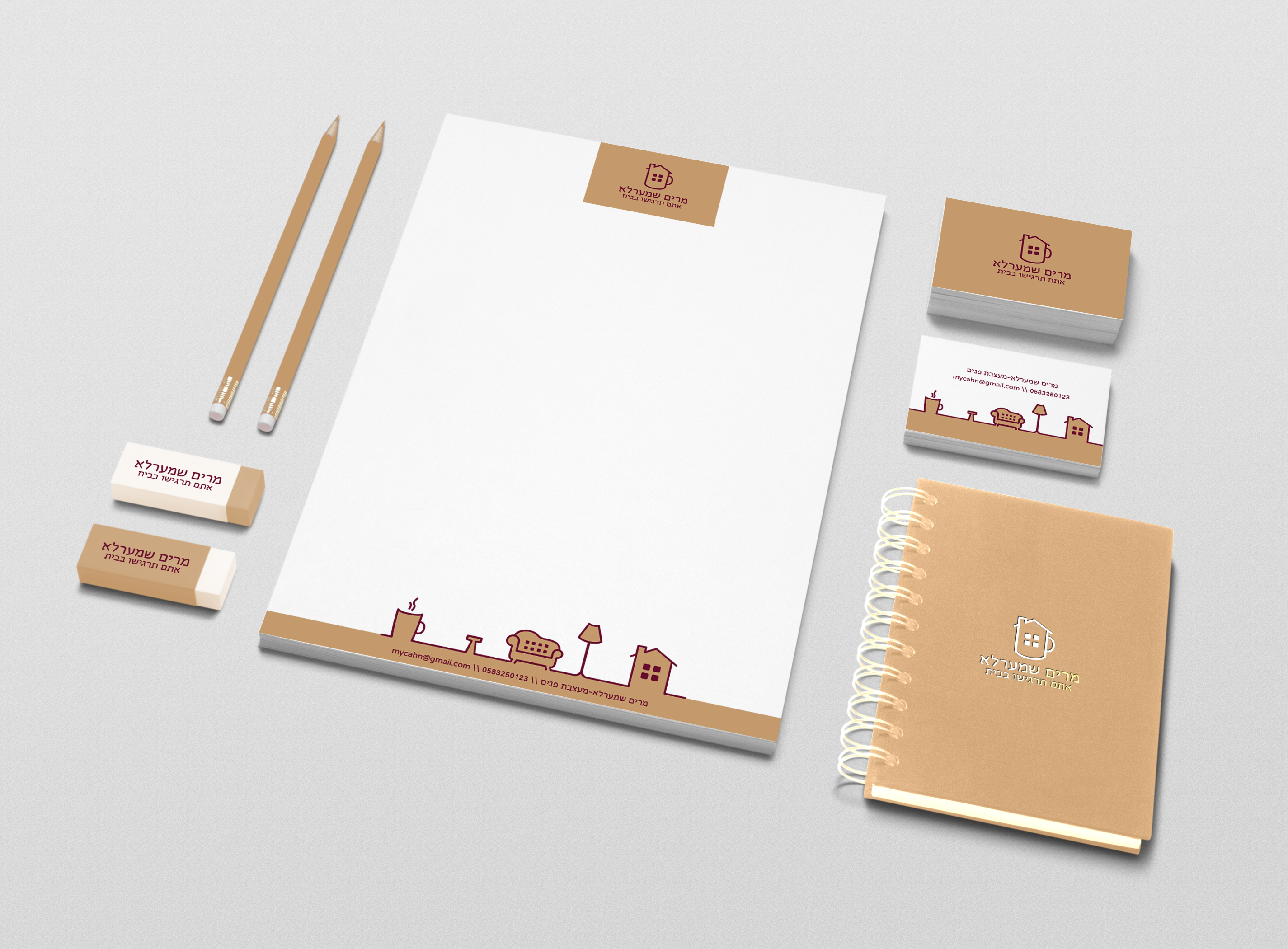 מוקאפ ניירת שחור לבן עם עפרונות ומחקים.png