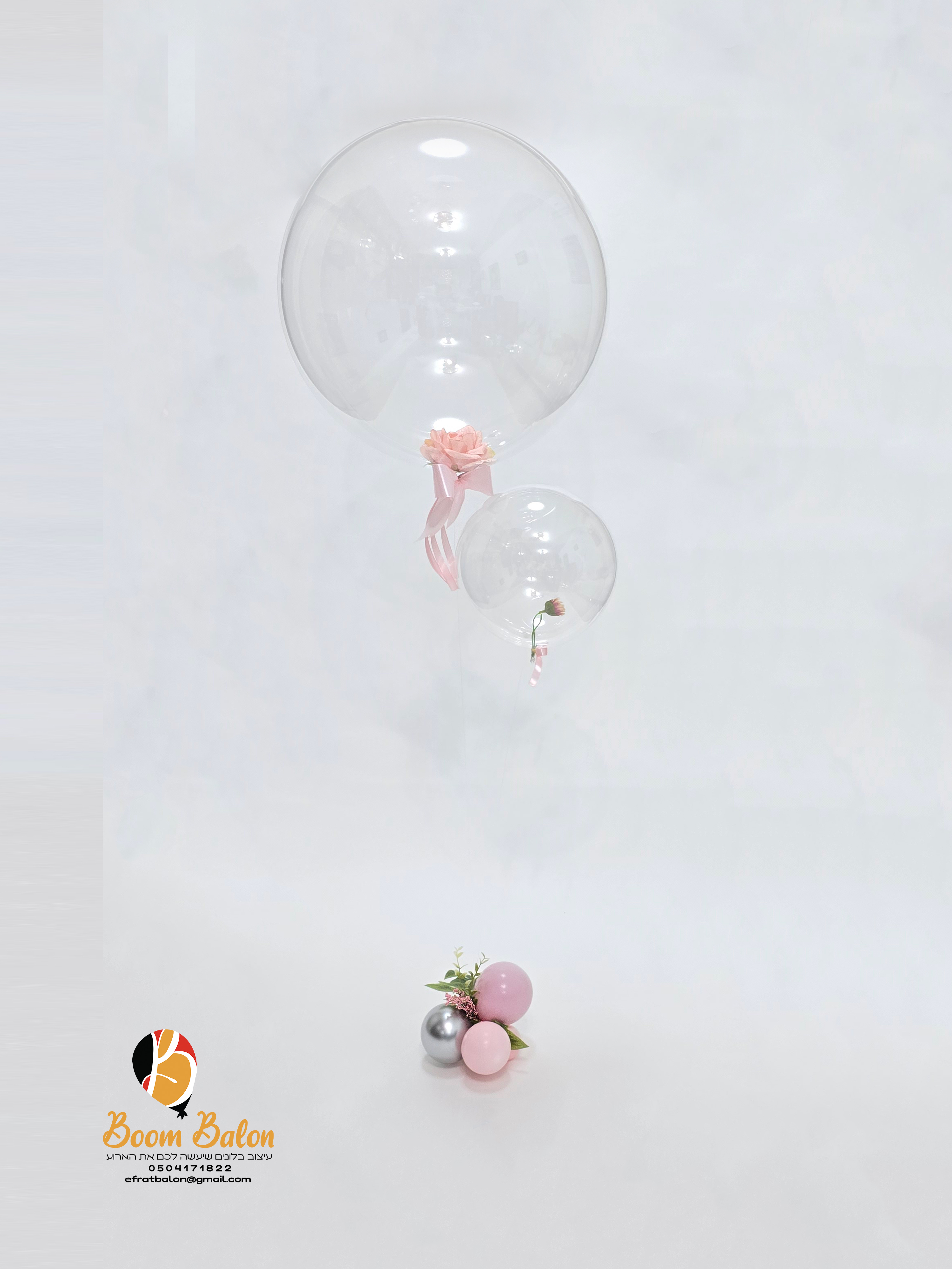 מרכז שלחן שקוף עפ פרחים.jpg