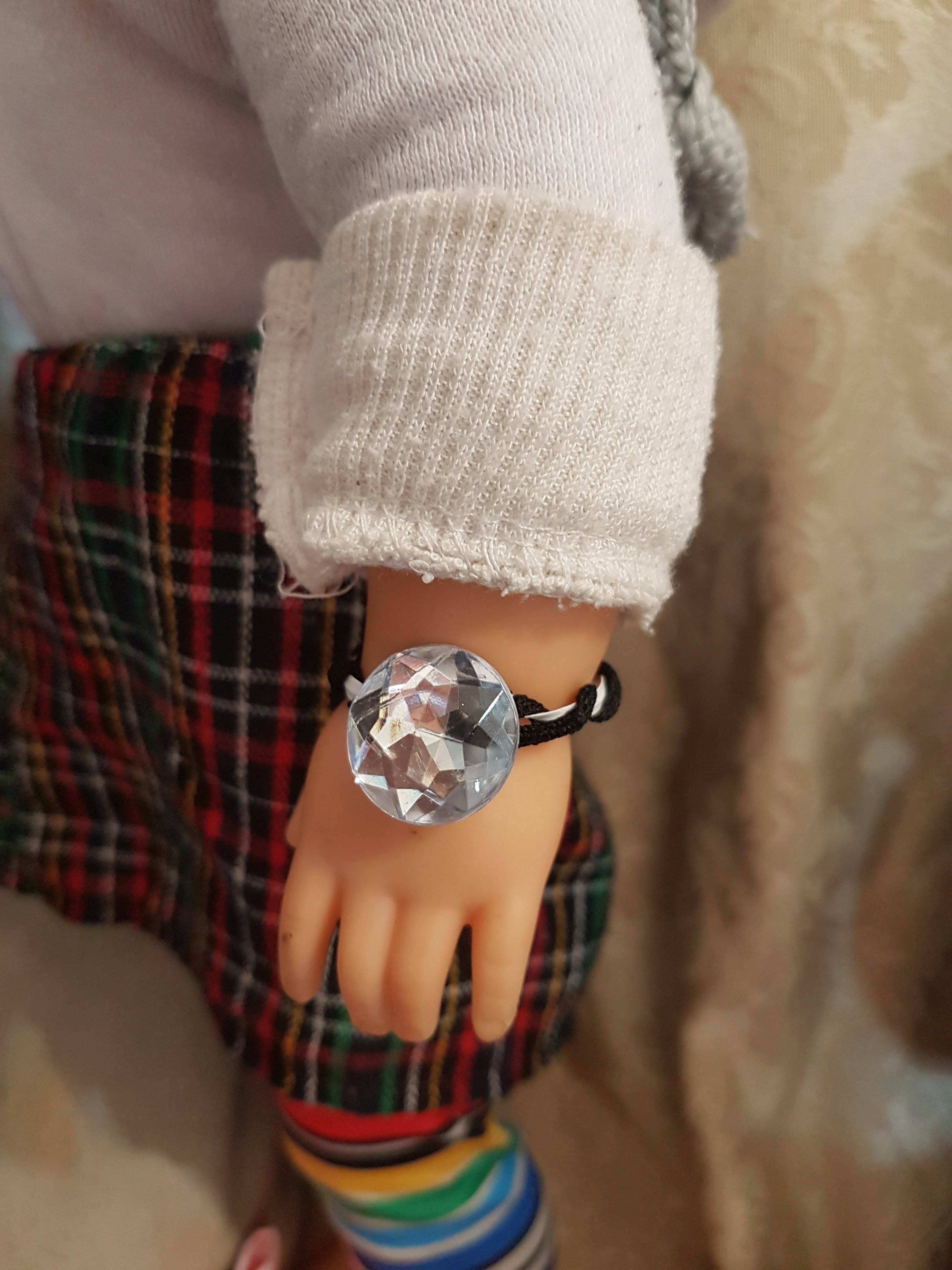 צמיד או שעון מפס המתכת של מסכה.jpg