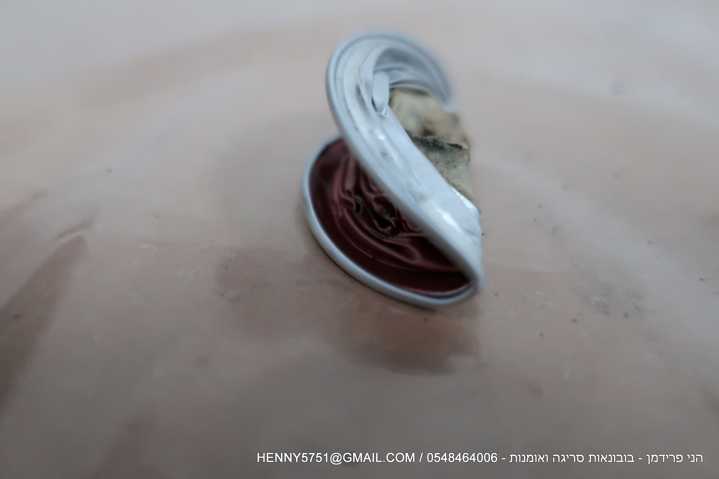 קפסולה מעוכה מקופלת.JPG