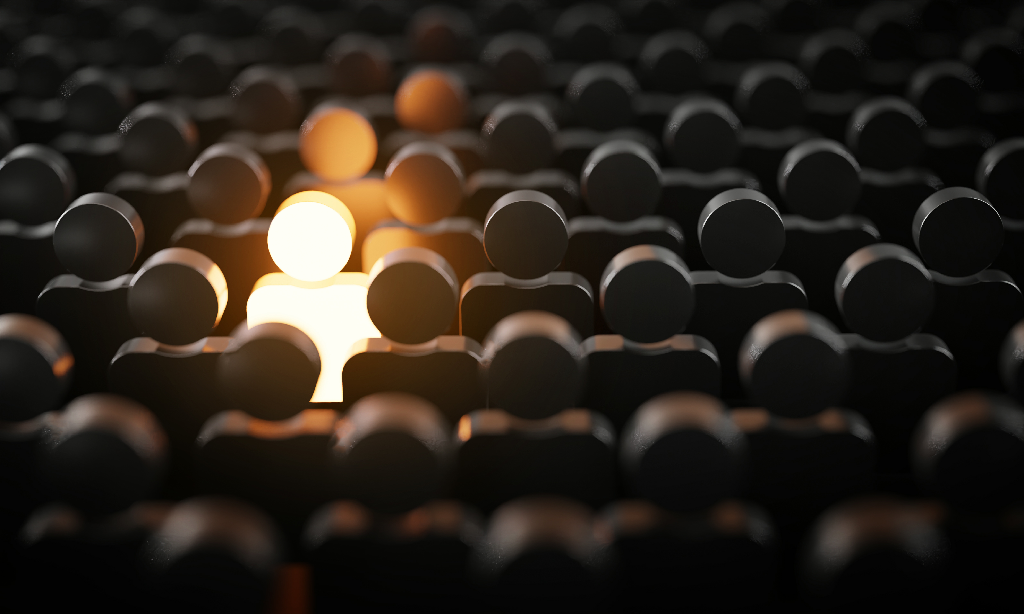 be-standout-3d-concept-one-man-glowing-among-other-people-dark-condition.png