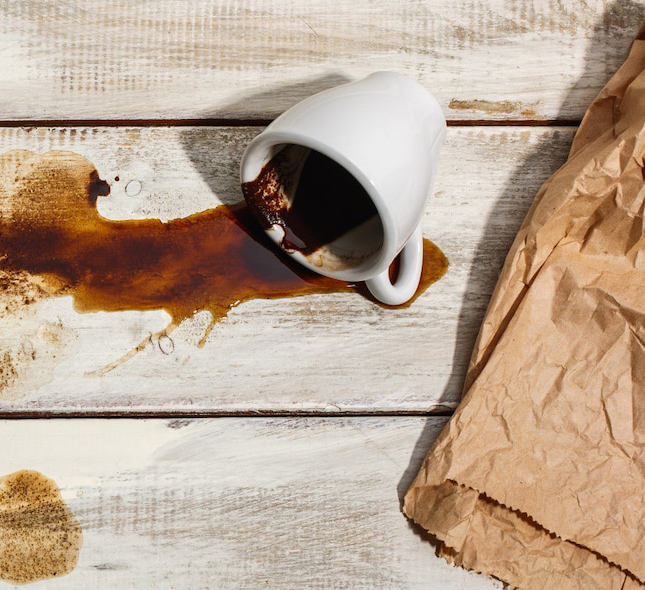 cup-coffee-spilled-wooden-table_155003-6429 copy.jpg