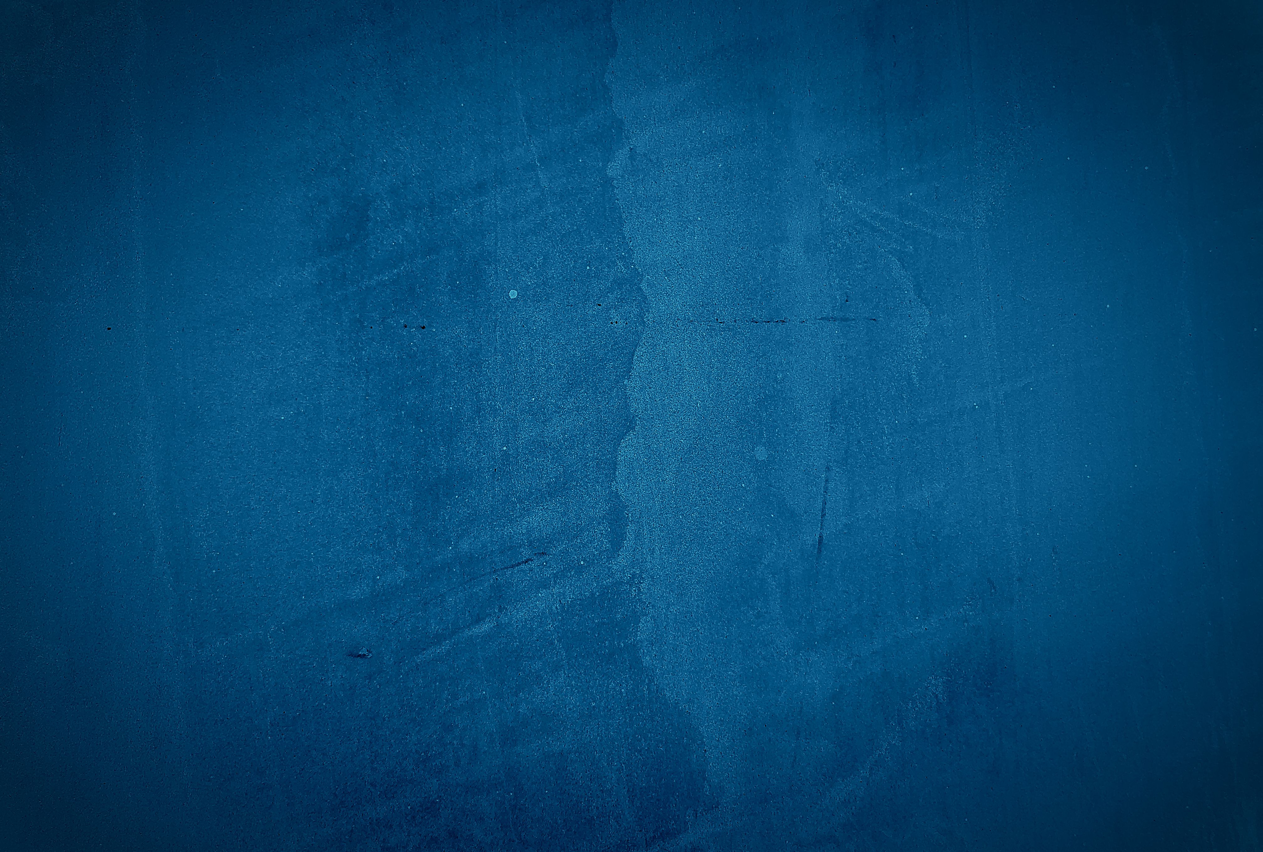 vintage-grunge-blue-concrete-texture-studio-wall-background-with-vignette.jpg