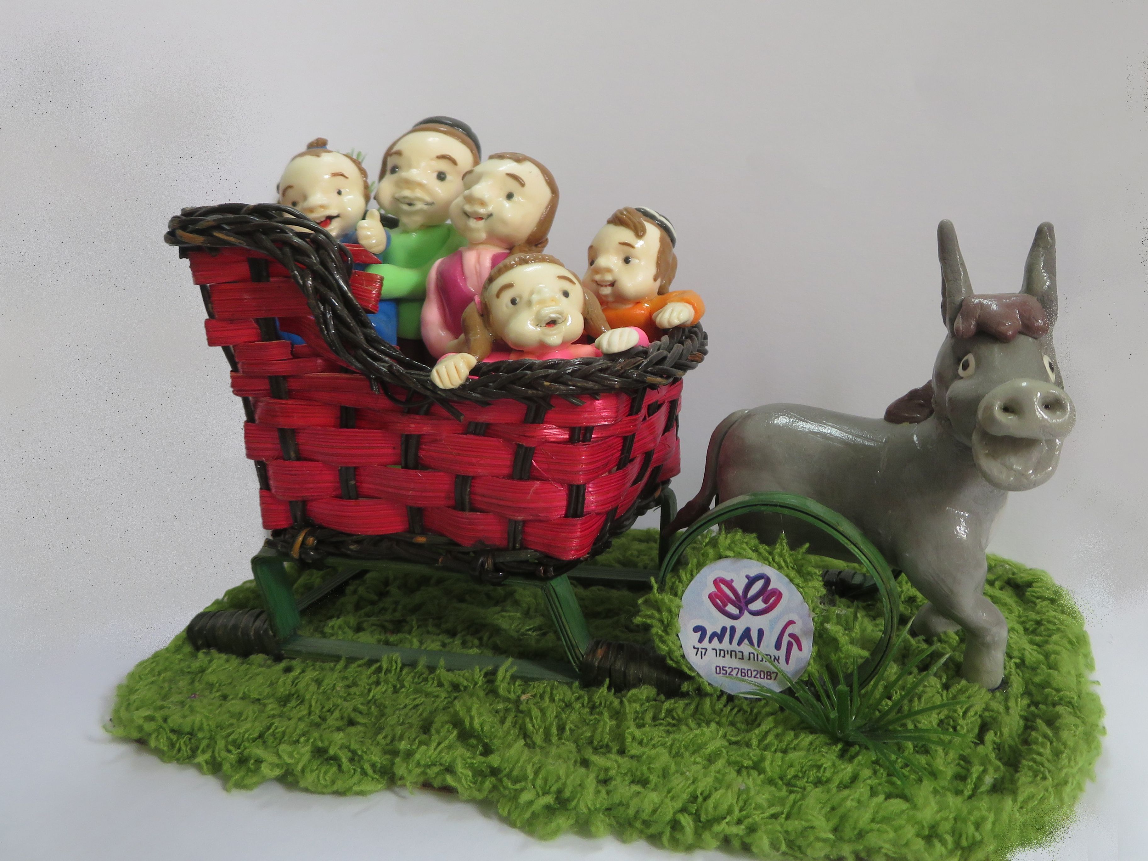 ילדים  על עגלה עם חמור.jpg