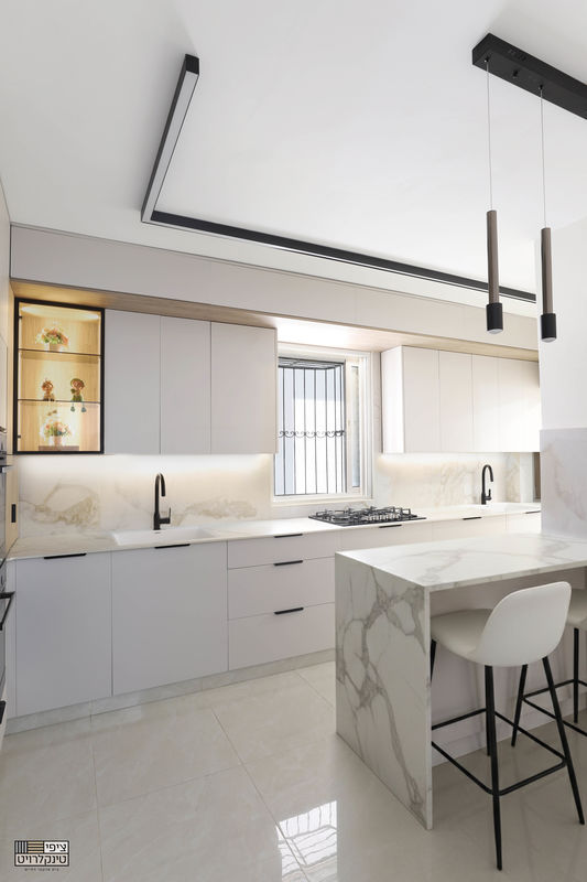 קמינר - מבט כללי_533x800.jpg