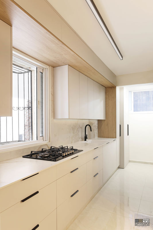 קמינר - מבט שיש_533x800.jpg