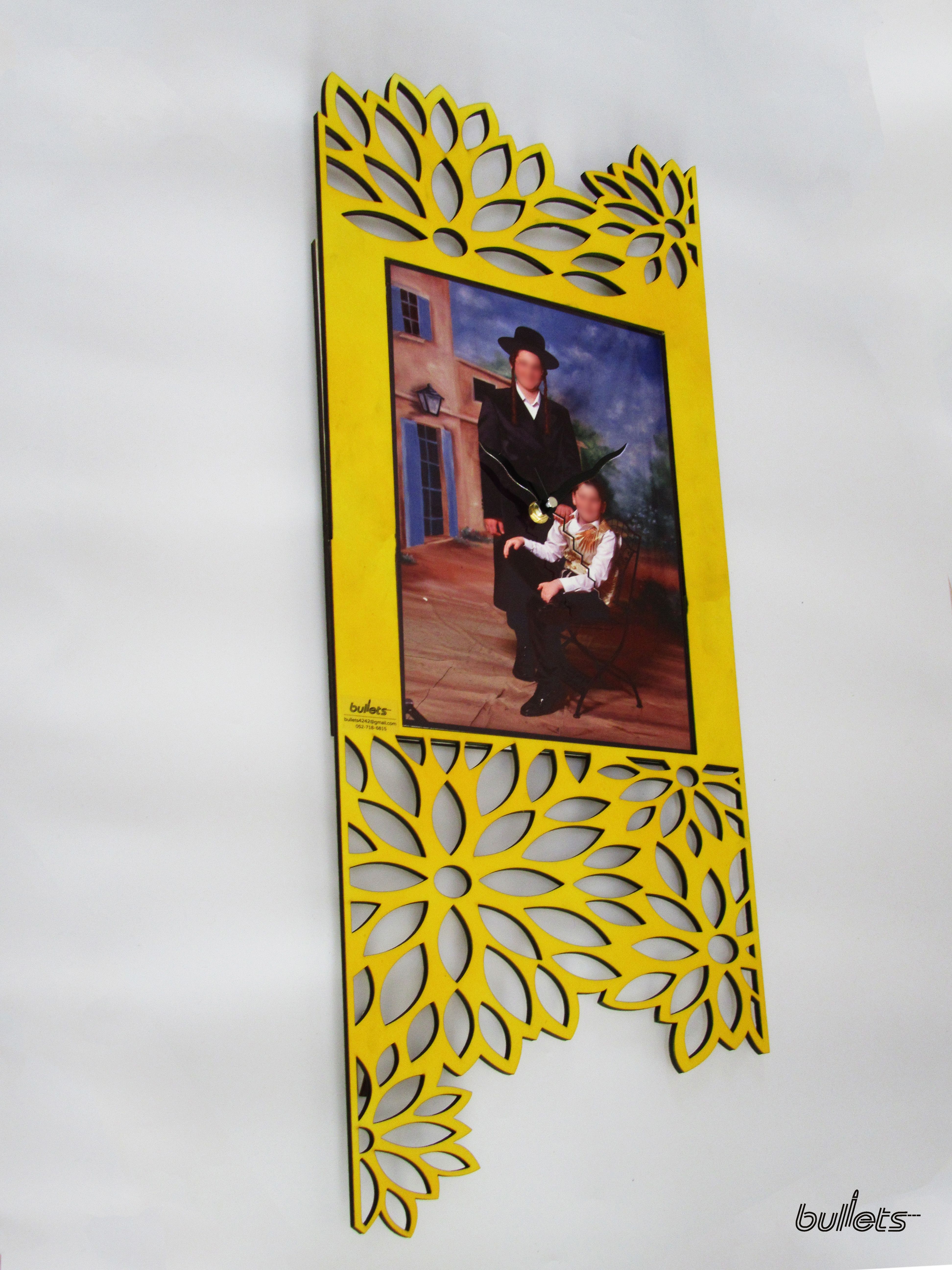 bullets שעון ענק עץ חיתוכי לייזר בשילוב תמונה.jpg