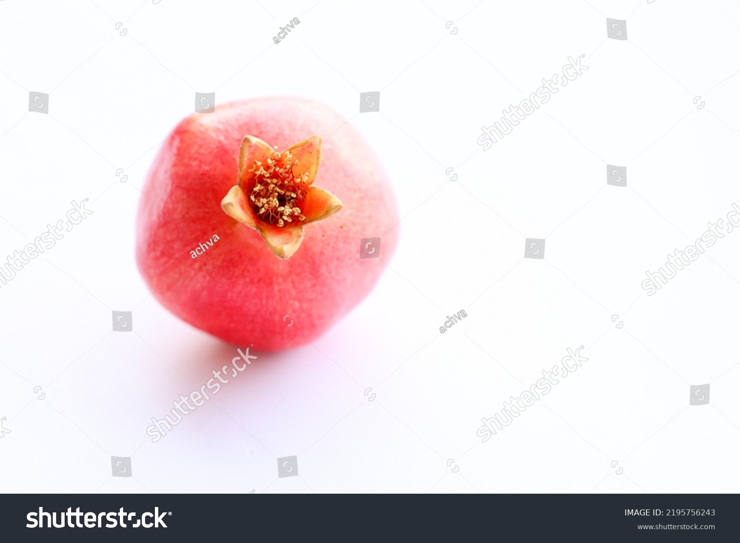 stock-photo-red-pomegranate-on-a-white-background-2195756243.jpg