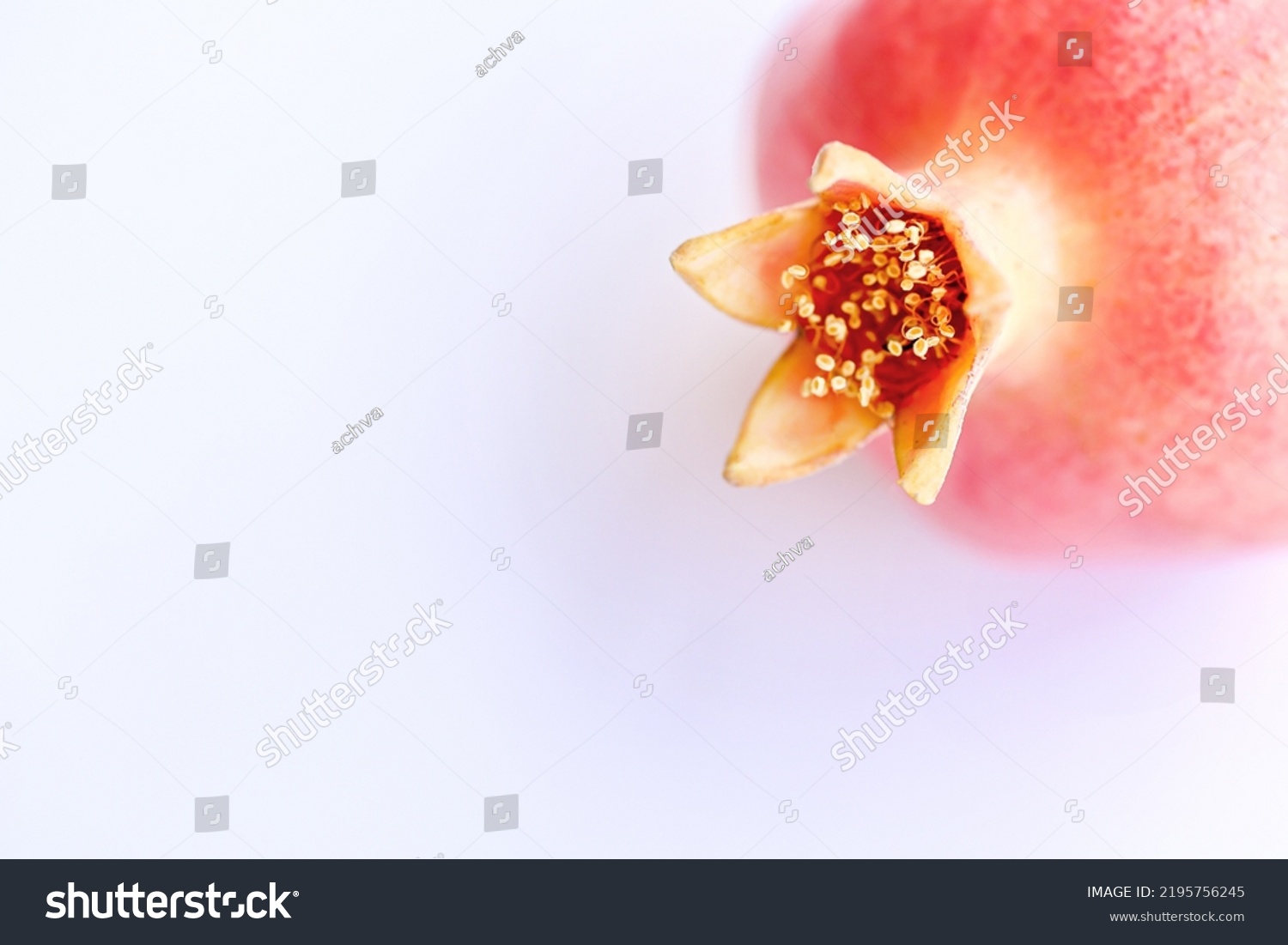 stock-photo-red-pomegranate-on-a-white-background-2195756245.jpg