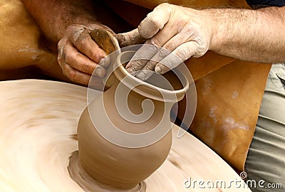 potter-making-clay-jug-thumb19690234.jpg
