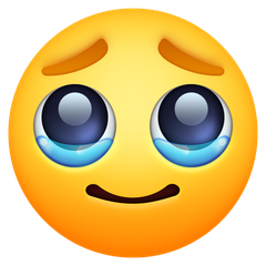 איך פרצוף עם דמעות emoji נראה על Facebook.